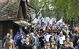 People participating in the March of the Living at the Auschwitz-Birkenau camp site in Poland, as Israel marks annual Holocaust Memorial Day, on May 2, 2019 (Yossi Zeliger/Flash90)