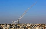 Smoke trails seen as rockets are launched from Rafah in the southern Gaza Strip toward Israel on May 4, 2019. (Abed Rahim Khatib/Flash90)