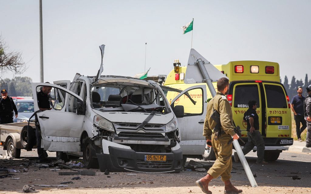 The scene of a car hit by a missile fired from the Gaza Strip near the Israel-Gaza border on May 5, 2019. (Noam Rivkin Fenton/Flash90)