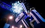 People watch fireworks during a show to mark Israel's 71st Independence Day in Jerusalem on May 8, 2019. (Hadas Parush/Flash90)