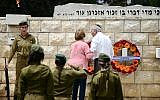 Israeli soldiers participate in an official Memorial Day ceremony in the Nahalat Yitshak Cemetery, Tel Aviv on May 8, 2019. (Tomer Neuberg/FLASH90