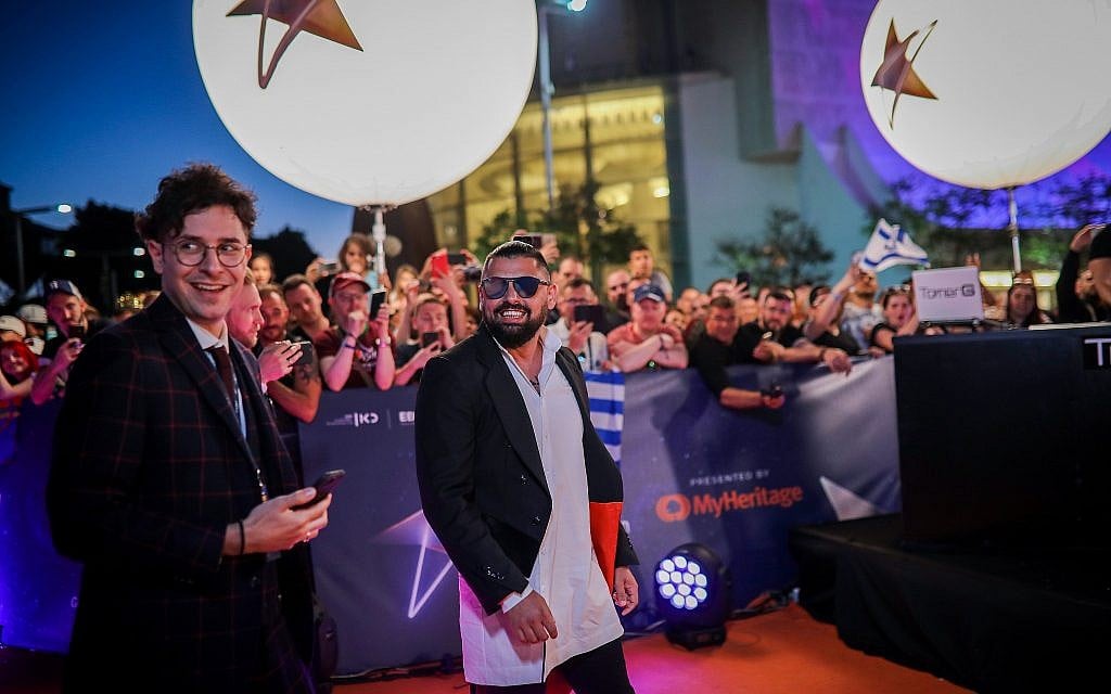 Hungarian contestant Joci Papai walks on the Orange Carpet, during the opening event of the 2019 Eurovision Song Contest, at Habima Square in Tel Aviv on May 12, 2019. (Hadas Parush/Flash90)