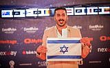 Kobi Marimi, Israel's contestant, walks on the Orange Carpet, during and opening event of the 2019 Eurovision Song Contest, at Habima Square in Tel Aviv, on May 12, 2019. (Hadas Parush/Flash90)