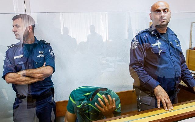 Ghassan Manduri, 36, from the Bedouin village of Tuba-Zangariyye in the Galilee, in court on suspicion of poisoning eight rare griffon vultures, May 13, 2019. (Basel Awidat/Flash90) Ghassan Manduri, 36, from the Bedouin village of Tuba-Zangariyye in the Galilee, in court on suspicion of poisoning eight rare griffon vultures, May 13, 2019. (Basel Awidat/Flash90)