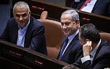 Prime Minister Benjamin Netanyahu (C) is seen during a Knesset vote to revoke a law limiting the number of government ministers, on May 20, 2019. (Noam Revkin Fenton/Flash90)