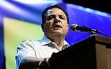 Hadash-Ta'al chairman Ayman Odeh speaks at a demonstration against Prime Minister Benjamin Netanyahu, outside the Tel Aviv Museum on May 25, 2019. (Tomer Neuberg/ Flash90)