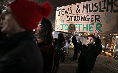 About 60 demonstrators gather outside the White House to protest the anti-Muslim policy proposals of President-elect Donald Trump. (Chip Somodevilla/Getty Images)