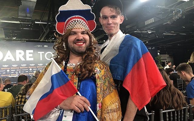 Two Russian fans, dressed in their country's colors for the second semifinal of Eurovision, on Thursday night, May 16, 2019 (Jessica Steinberg/Times of Israel) Two Russian fans, dressed in their country's colors for the second semifinal of Eurovision, on Thursday night, May 16, 2019 (Jessica Steinberg/Times of Israel)