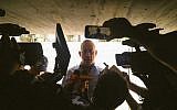 Blue and White leader Benny Gantz gives an impromptu press conference in a bomb shelter at Yad Mordechai as rockets fly overhead on May 5, 2019. (Raoul Wootliff/Times of Israel)