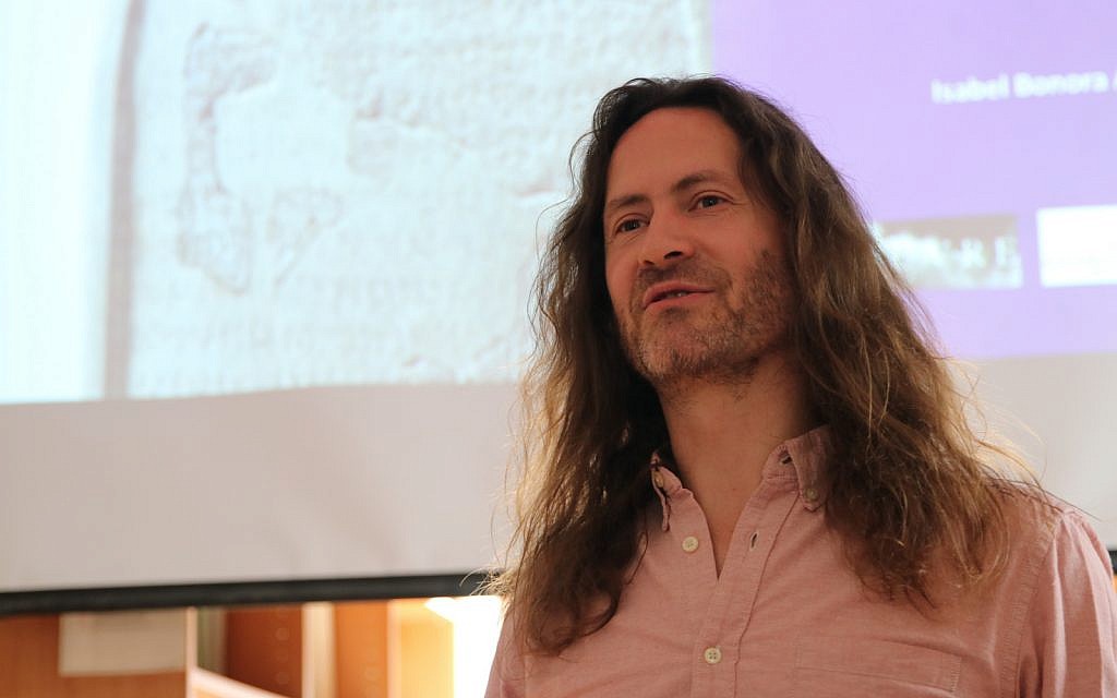 Scholar Michael Langlois lectures on the Mesha Stele at the French Research Center in Jerusalem on November 29, 2018. (Matthew Morgenstern)