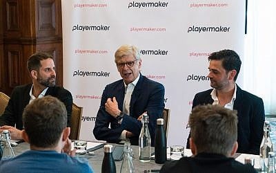 PlayerMaker's CEO Guy Aharon, left, former Arsenal manager Arsène Wenger, center, and Yuval Odem the COO of PlayerMaker. (Woody Rankin)