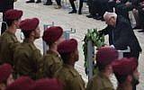 President Reuven Rivlin lays a wreath in honor of Holocaust victims at Yad Vashem in Jerusalem on Holocaust Remembrance Day, May 2, 2019 (Kobi Gideon / GPO)