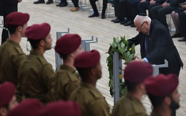 President Reuven Rivlin lays a wreath in honor of Holocaust victims at Yad Vashem in Jerusalem on Holocaust Remembrance Day, May 2, 2019 (Kobi Gideon / GPO) President Reuven Rivlin lays a wreath in honor of Holocaust victims at Yad Vashem in Jerusalem on Holocaust Remembrance Day, May 2, 2019 (Kobi Gideon / GPO)