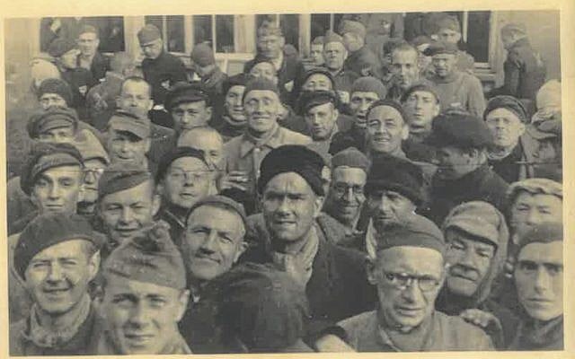 Photograph from the liberation of the Dachau camp on April 29, 1945, held in the collection of Belgian underground operative Adrian Aloy. (Kedem Auction House) Photograph from the liberation of the Dachau camp on April 29, 1945, held in the collection of Belgian underground operative Adrian Aloy. (Kedem Auction House)