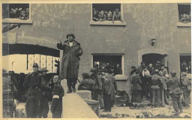 Photograph from the liberation of the Dachau camp on April 29, 1945, held in the collection of Belgian underground operative Adrian Aloy. (Kedem Auction House) Photograph from the liberation of the Dachau camp on April 29, 1945, held in the collection of Belgian underground operative Adrian Aloy. (Kedem Auction House)