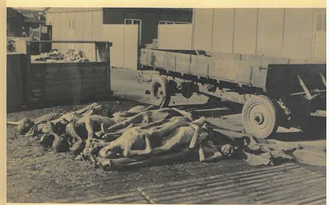 Photograph from the liberation of the Dachau camp on April 29, 1945, held in the collection of Belgian underground operative Adrian Aloy. (Kedem Auction House) Photograph from the liberation of the Dachau camp on April 29, 1945, held in the collection of Belgian underground operative Adrian Aloy. (Kedem Auction House)