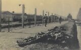 Photograph from the liberation of the Dachau camp on April 29, 1945, held in the collection of Belgian underground operative Adrian Aloy. (Kedem Auction House)