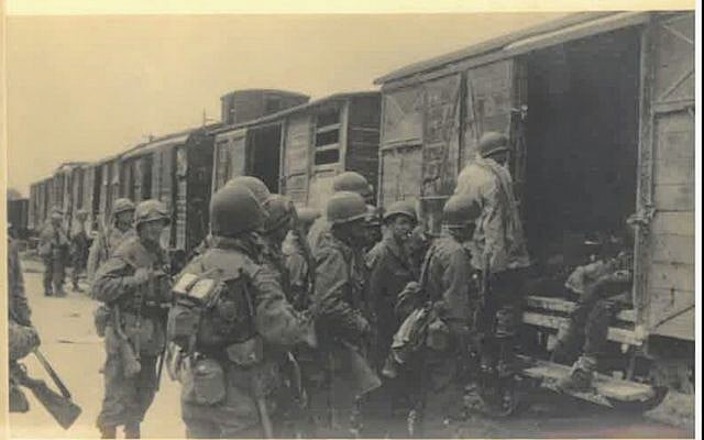 Photograph from the liberation of the Dachau camp on April 29, 1945, held in the collection of Belgian underground operative Adrian Aloy. (Kedem Auction House) Photograph from the liberation of the Dachau camp on April 29, 1945, held in the collection of Belgian underground operative Adrian Aloy. (Kedem Auction House)