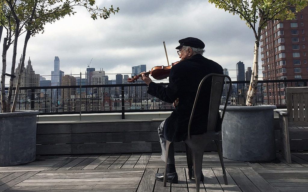 Sheldon Harnick playing the violin in 'Fiddler: A Miracle of Miracles.' (Courtesy Pacific Northwest Pictures)