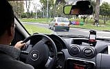 Uber driver.  (CC BY 2.0 Wikipedia/Alexander Torrenegra)