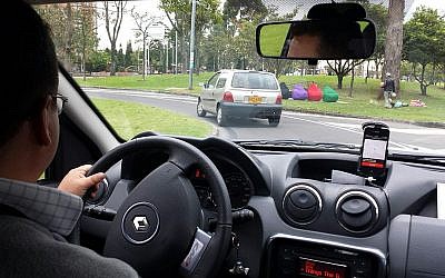 Uber driver.  (CC BY 2.0 Wikipedia/Alexander Torrenegra)