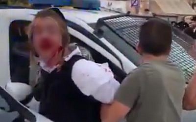 Police arresting an ultra-Orthodox teenager with autism in Jerusalem, May 22, 2019. (YouTube screenshot