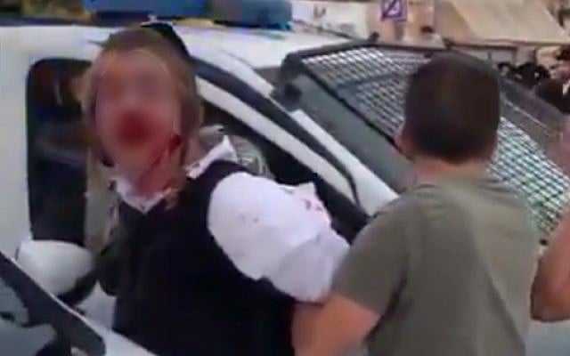 Police arresting an ultra-Orthodox teenager with autism in Jerusalem, May 22, 2019. (YouTube screenshot Police arresting an ultra-Orthodox teenager with autism in Jerusalem, May 22, 2019. (YouTube screenshot