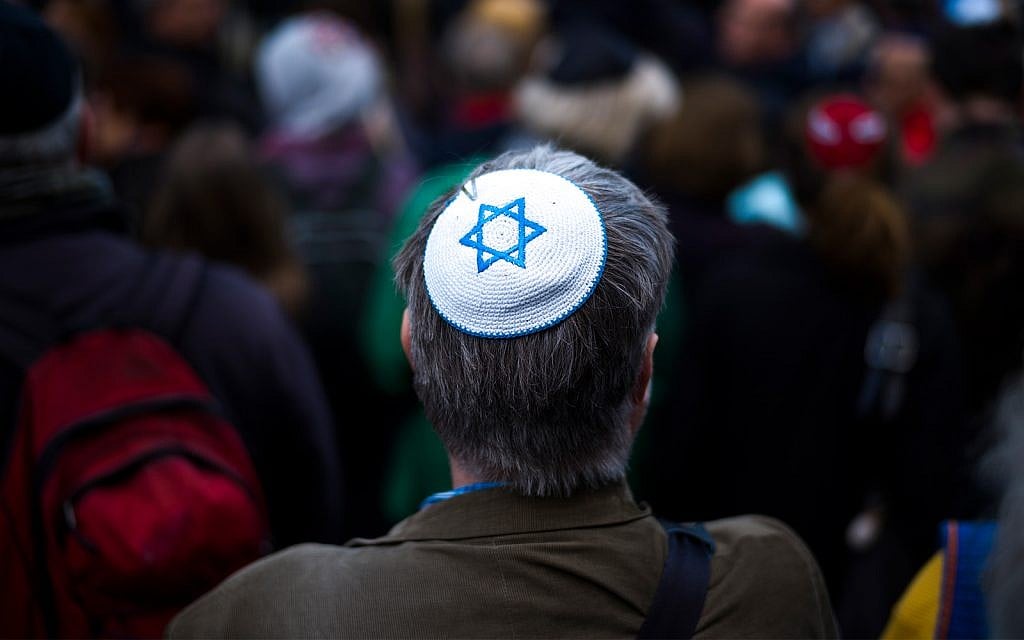 Illustrative: A man wears a kippah at a demonstration against an anti-Semitic attack in Berlin, Germany, April 25, 2018. (AP Photo/Markus Schreiber) Illustrative: A man wears a kippah at a demonstration against an anti-Semitic attack in Berlin, Germany, April 25, 2018. (AP Photo/Markus Schreiber)