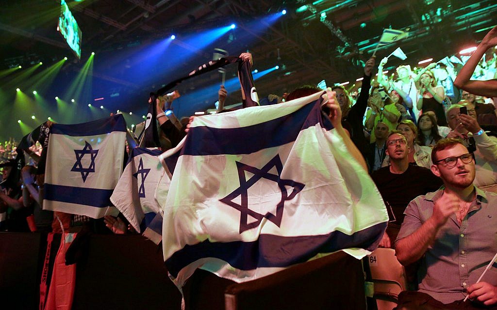 Spectators watch the 2019 Eurovision Song Contest grand final in Tel Aviv, May 18, 2019. (AP Photo/Sebastian Scheiner)