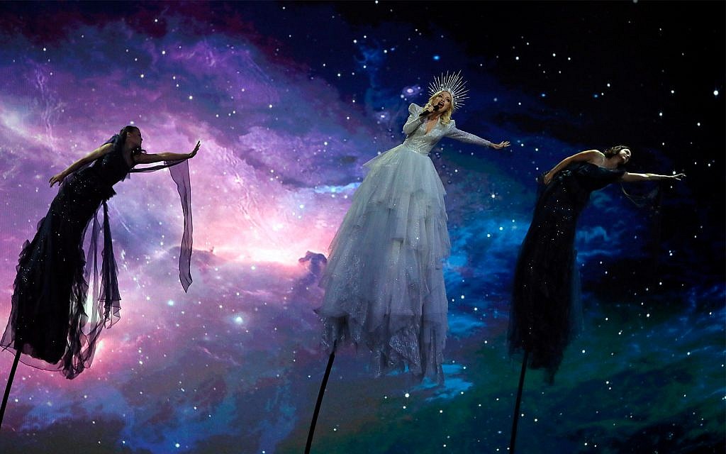 Kate Miller-Heidke of Australia, center, performs the song "Zero Gravity" during the 2019 Eurovision Song Contest grand final in Tel Aviv, May 18, 2019. (AP Photo/Sebastian Scheiner)