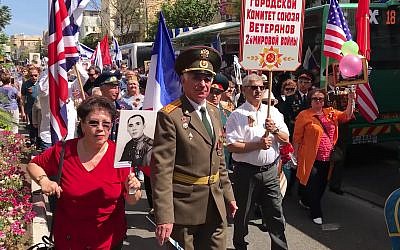 Red Army veterans and supporters march in Haifa for Victory Day, celebrating victory over the Nazi regime in World War II, on May 10, 2019. (YouTube screenshot)