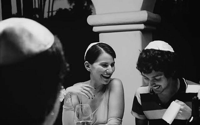 A Passover seder seen in Vampire Weekend’s "This Life" music video. (YouTube screenshot) A Passover seder seen in Vampire Weekend’s "This Life" music video. (YouTube screenshot)