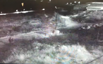 Two suspects are seen in the West Bank settlement of Migdalim after breaking through the perimeter fence (Courtesy)