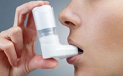 Illustrative image of a patient taking asthma medication (Remains; iStock by Getty Images)