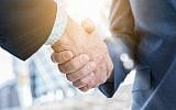 Illustrative image of a handshake (stnazkul; iStock by Getty Images)