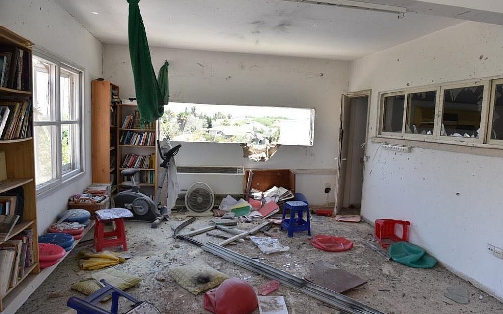 The interior of a house hit by a rocket in the Eshkol Regional Council on May 4, 2019. The family had escaped to a shelter moments earlier (Israel Police)
