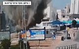Security footage shows the moment a rocket hits the town of Kiryat Gat, May 4, 2019 (Screen grab via Channel 13 news)