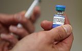 A one dose bottle of measles, mumps and rubella virus vaccine, made by Merck, seen at the Salt Lake County Health Department in Salt Lake City, April 26, 2019 (George Frey/Getty Images via JTA)