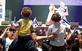 File: Children waving Israeli and American flags at the Celebrate Israel parade in New York City, June 4, 2017. (Perry Bindelglass via JTA)
