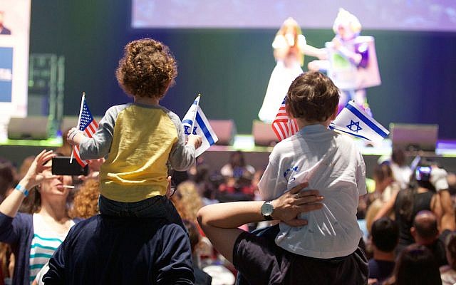 File: Children waving Israeli and American flags at the Celebrate Israel parade in New York City, June 4, 2017. (Perry Bindelglass via JTA) File: Children waving Israeli and American flags at the Celebrate Israel parade in New York City, June 4, 2017. (Perry Bindelglass via JTA)