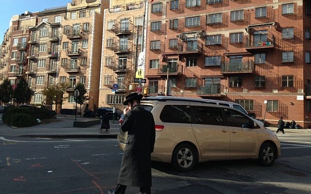 A haredi Orthodox man crosses the street in Williamsburg, Brooklyn. (Gil Shefler via JTA) A haredi Orthodox man crosses the street in Williamsburg, Brooklyn. (Gil Shefler via JTA)