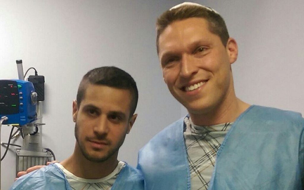 Rabbi Shmuly Yanklowitz, right, at hospital with his kidney recipient. (Courtesy)