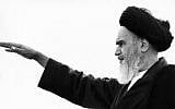In this photo taken on September 26, 1980, the late founder of the Islamic Revolution Ayatollah Ruhollah Khomeini salutes his followers in the Iranian capital of Tehran. (Stig Nillson/AFP)