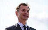 Britain's Foreign Secretary Jeremy Hunt speaks to the media at Stansted Airport, north of London on June 3, 2019. (ISABEL INFANTES / AFP)