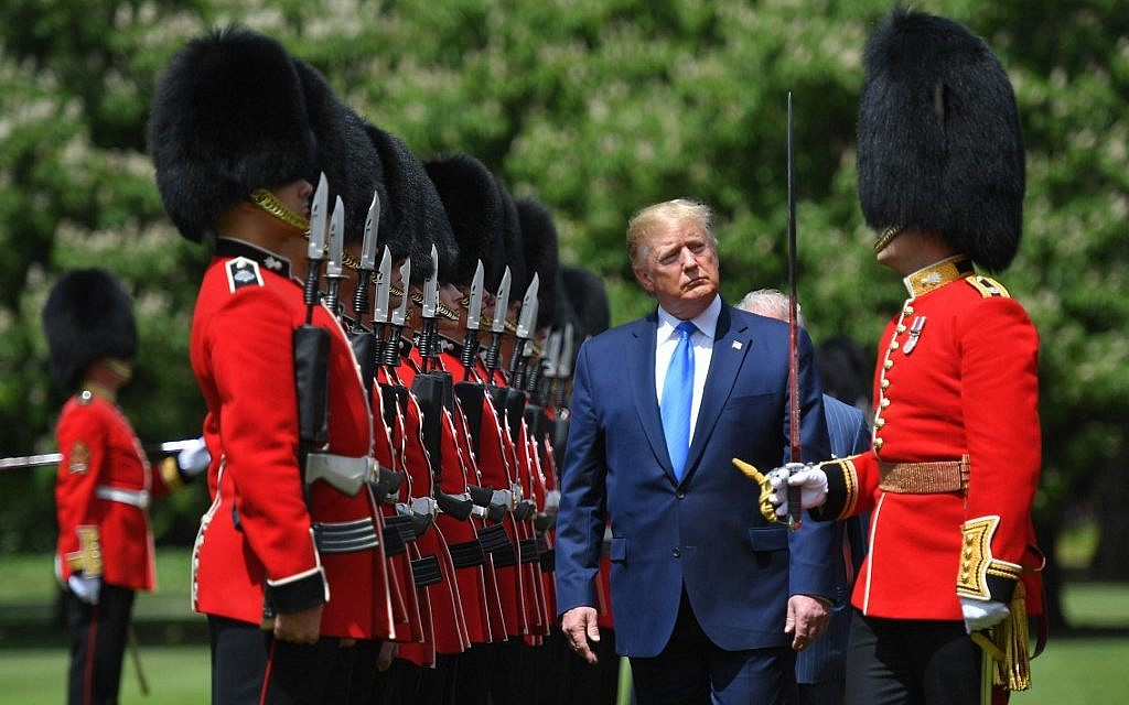 US President Donald Trump inspects an honour guard during a welcome ceremony at Buckingham Palace in central London on June 3, 2019, on the first day of their three-day State Visit to the UK. (MANDEL NGAN / AFP)