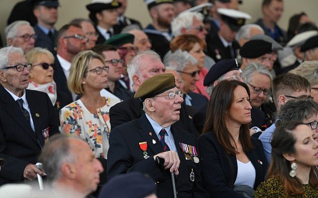 Veterans watch during an event to commemorate the 75th anniversary of the D-Day landings, in Portsmouth, southern England, on June 5, 2019. (Mandel Ngan/AFP)