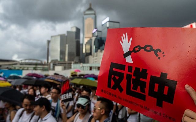 Protesters march during a rally against a controversial extradition law proposal in Hong Kong on June 9, 2019 (Philip FONG / AFP)