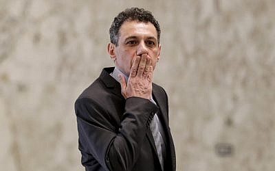 Nizar Zakka, a Lebanese national and US resident arrested in 2015 and sentenced to 10 years in jail on espionage charges, blows a kiss to journalists after being freed, at the presidential palace in Baabda, east of the capital Beirut on June 11, 2019. (ANWAR AMRO / AFP)