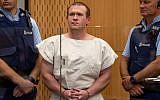 In this picture taken on March 16, 2019, Brenton Tarrant (C), the man charged in relation to the Christchurch massacre, stands in the dock during his appearance at the Christchurch District Court. (Mark Mitchell/Pool/AFP)