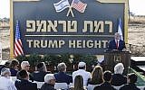 Prime Minister Benjamin Netanyahu gives a speech before the newly-unveiled sign for the new settlement of 'Ramat Trump,' or 'Trump Heights' in English, named after the US President during an official ceremony in the Golan Heights on June 16, 2019. (Jalaa MAREY/AFP)